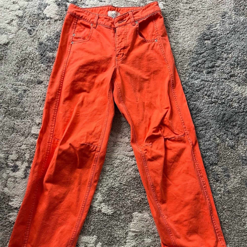 Low-rise orange jeans